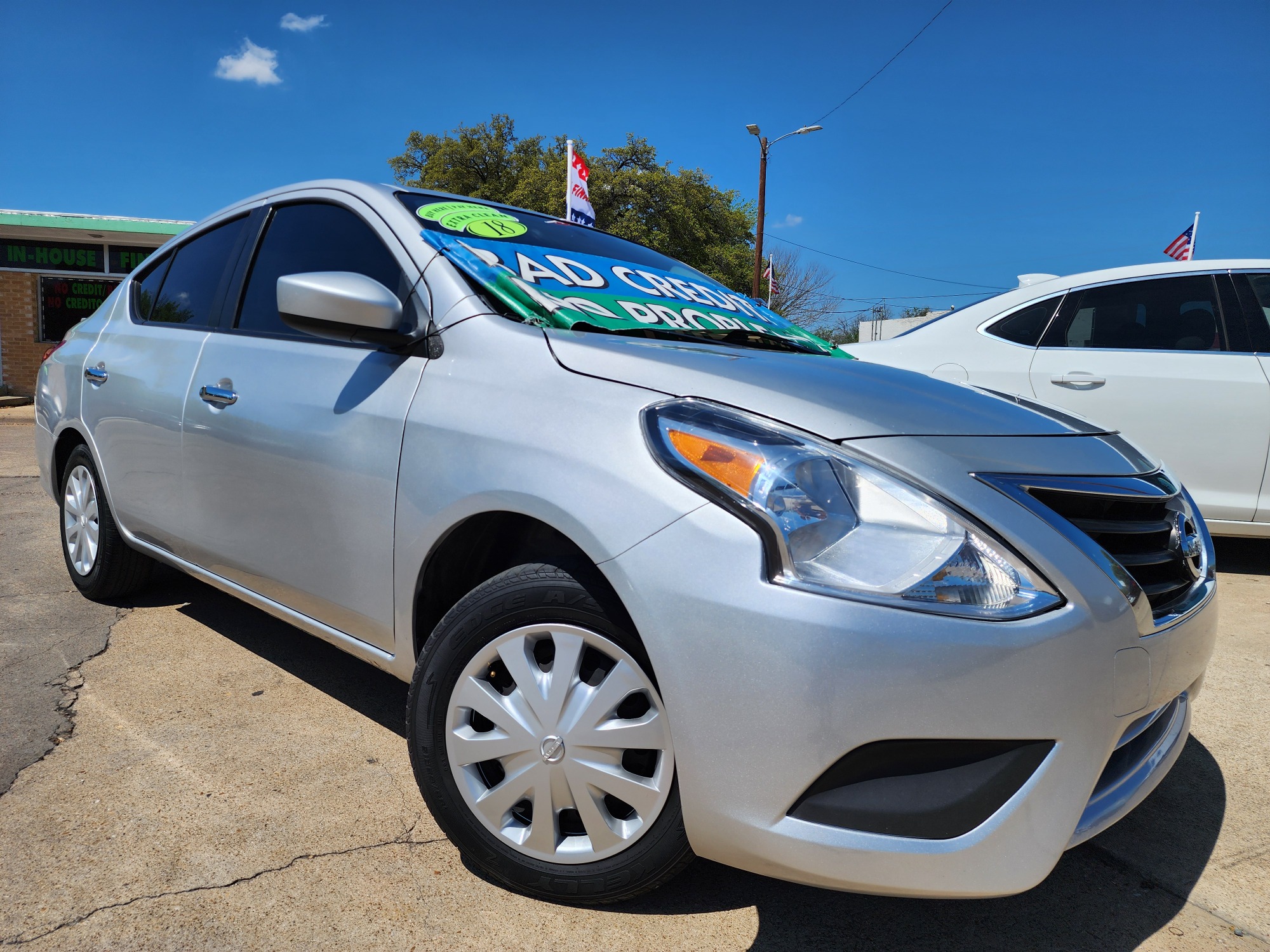 2018 SILVER Nissan Versa SV (3N1CN7AP7JK) with an 1.6L L4 DOHC 16V engine, CVT transmission, located at 2660 S.Garland Avenue, Garland, TX, 75041, (469) 298-3118, 32.885551, -96.655602 - Welcome to DallasAutos4Less, one of the Premier BUY HERE PAY HERE Dealers in the North Dallas Area. We specialize in financing to people with NO CREDIT or BAD CREDIT. We need proof of income, proof of residence, and a ID. Come buy your new car from us today!! This is a SUPER CLEAN 2018 NISSAN VER - Photo #0